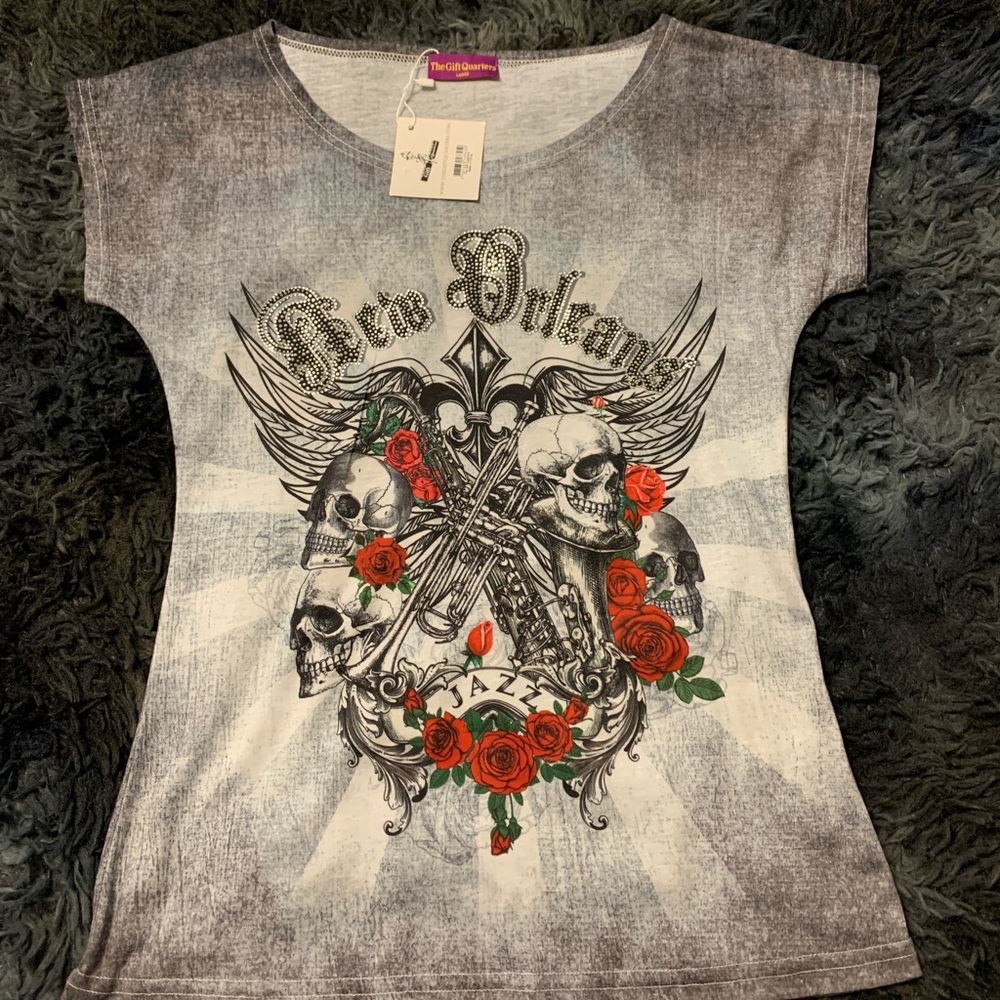 Size large woman’s T-shirt. From New Orleans on bourbon street boutique.